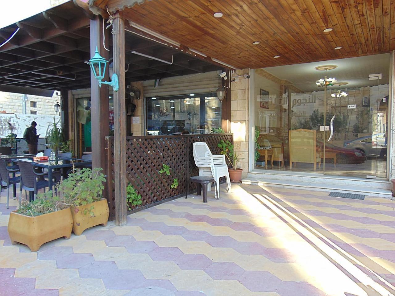 Al-Nujoom Hotel Suites Amman Esterno foto